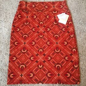 Lularoe Cassie Skirt. Burnt Orange/Aztec designs